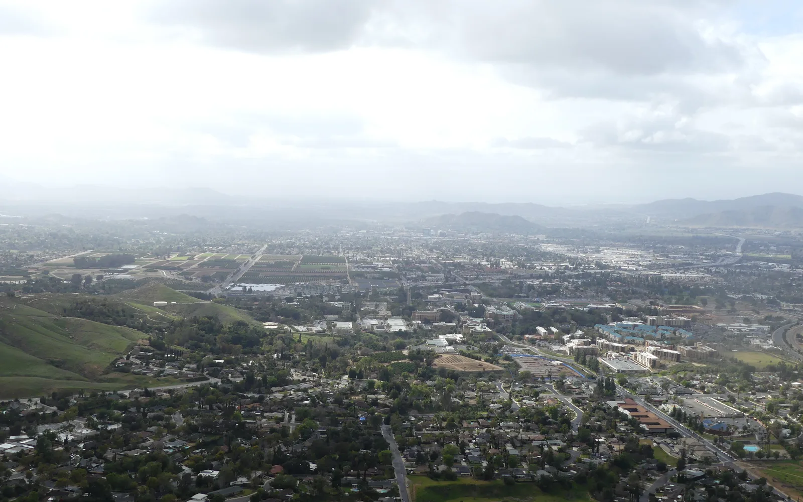 UC Riverside campus with bell tower and botanical gardens visible from Box Spring Mountain